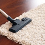 vacuuming carpet